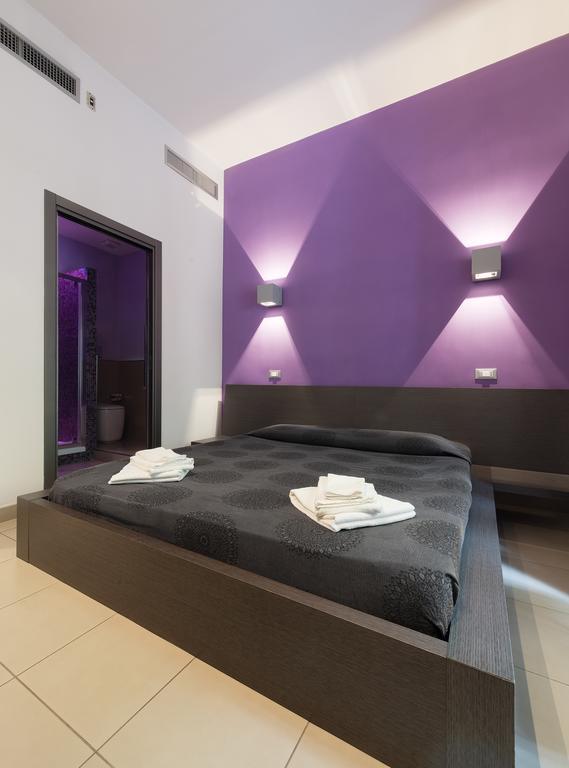 Chroma Suites Chambre photo